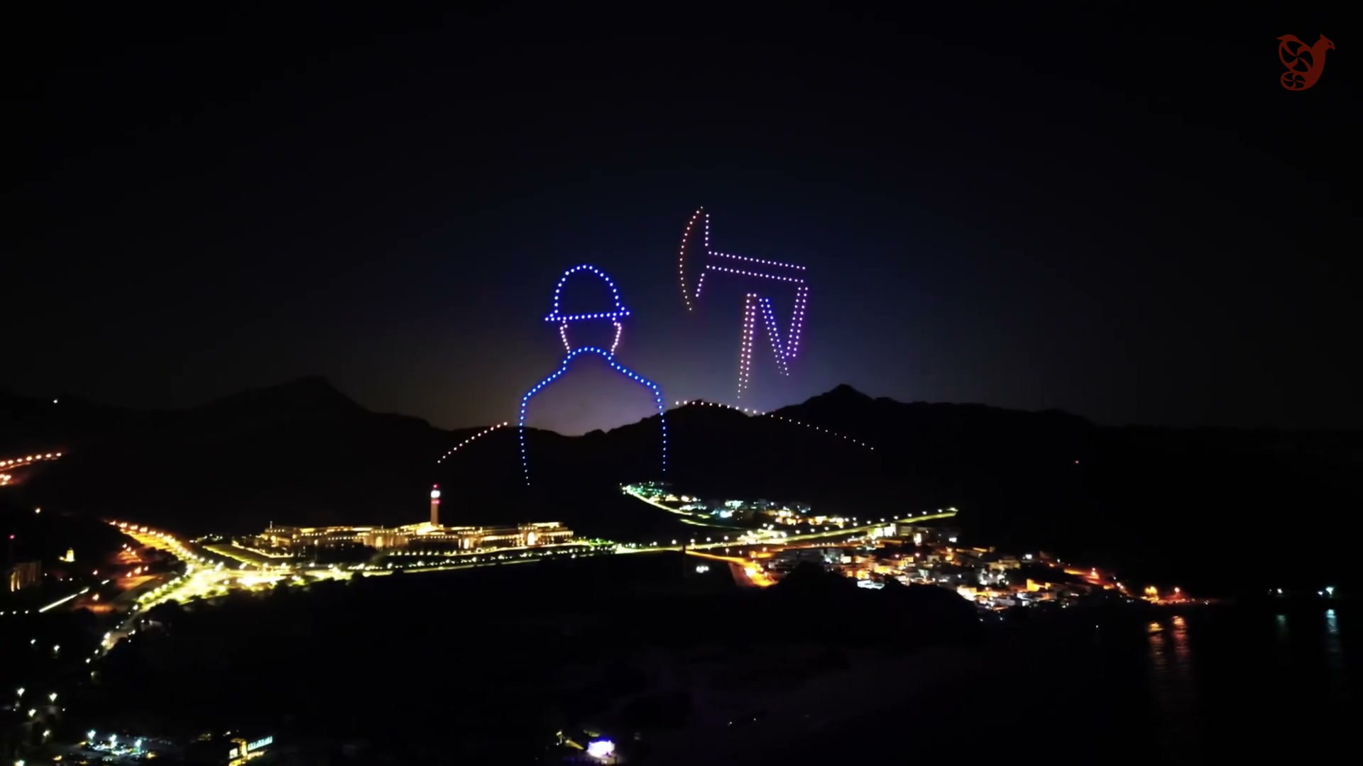 Drone show in Muscat, Oman: an oil pump jack and a worker in a hard hat drawn by drones