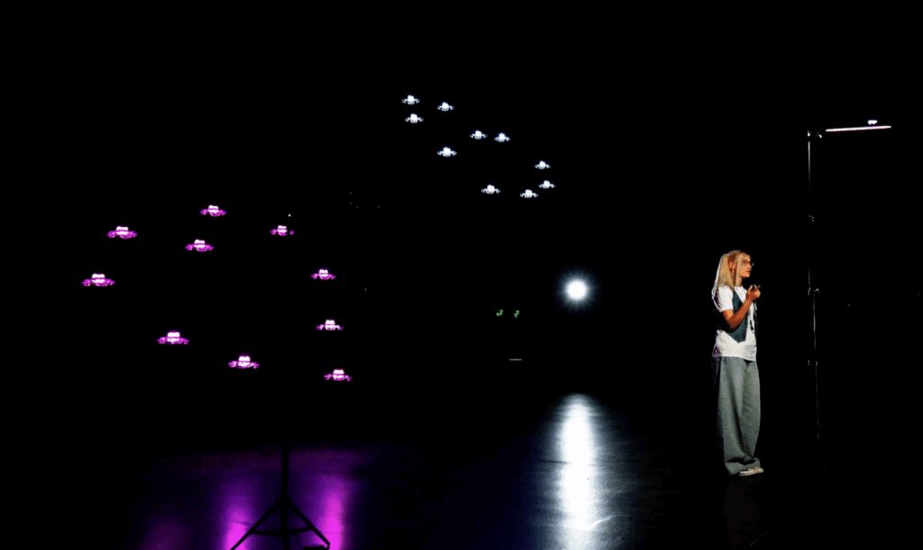 Indoor drone show on music video set