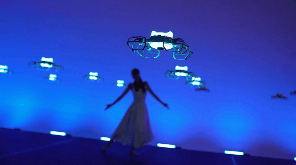 Dancer performing with drones
